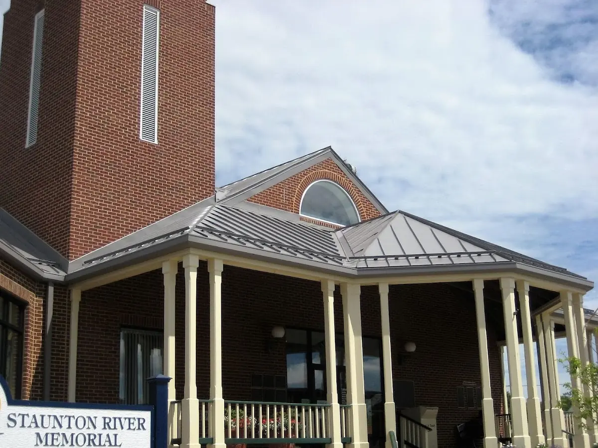 Skilled roofing craftsmen working on a residential roof in Atlanta